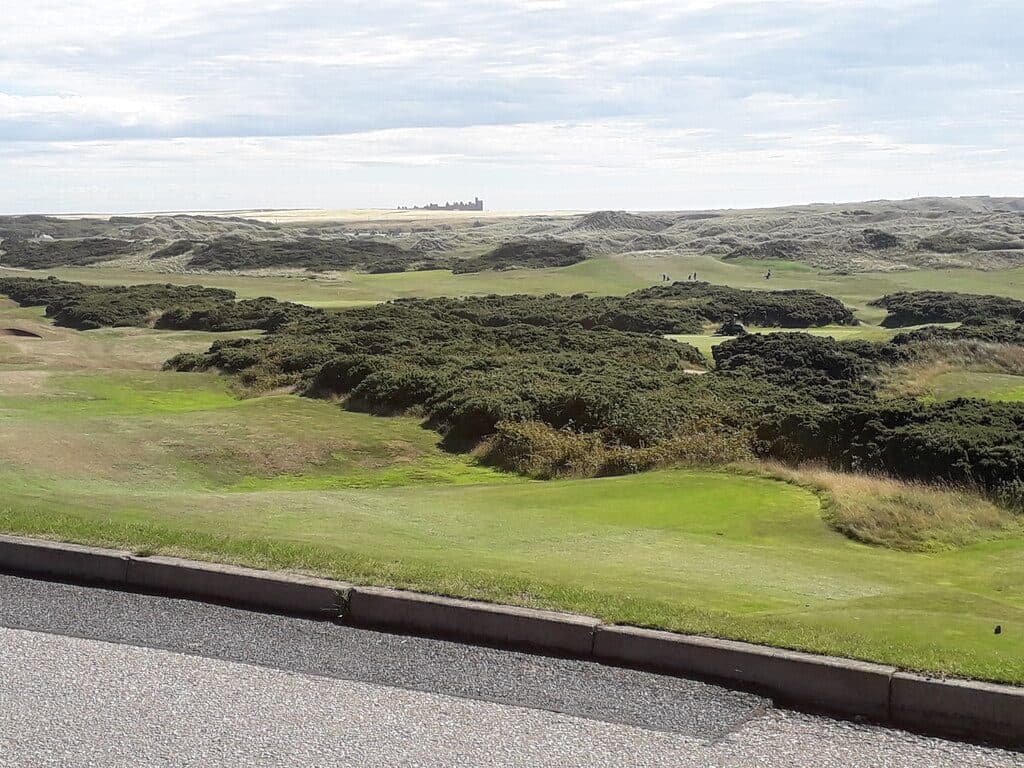 Cruden Bay golf course with Slains Castle in the distance